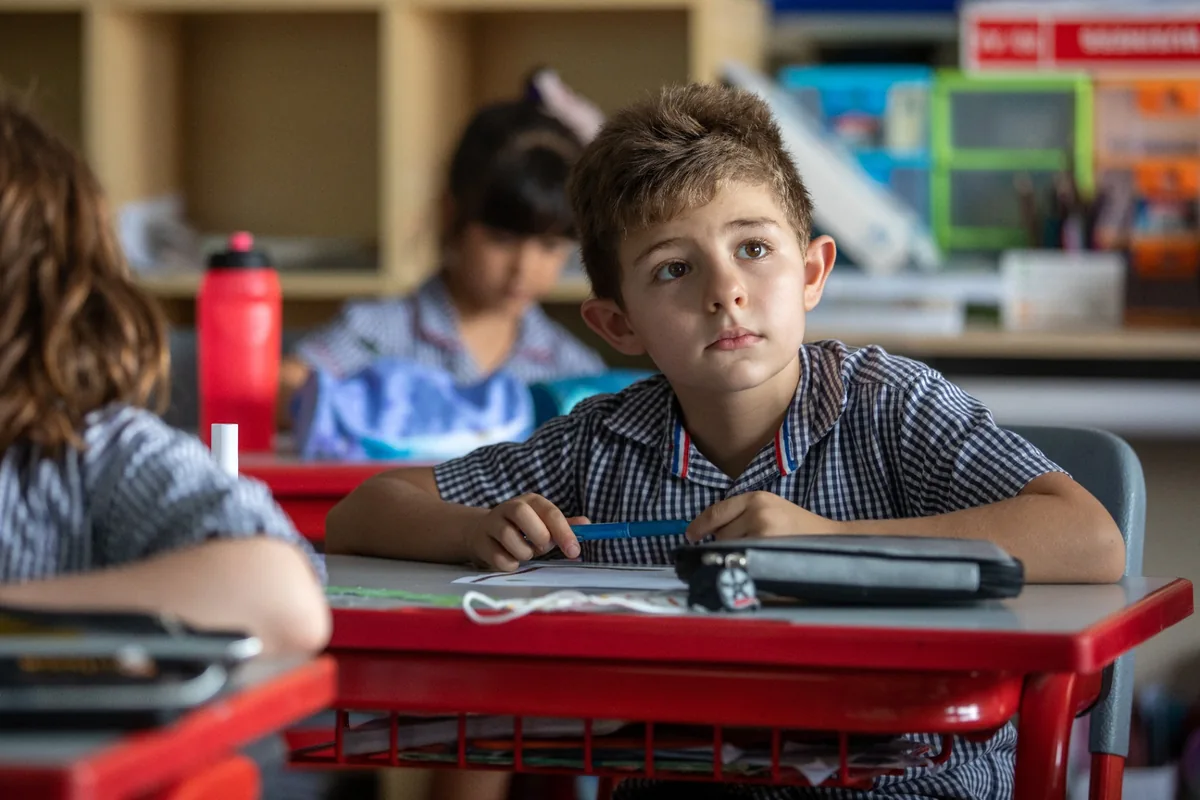 LFIB student listening attentively in a classroom